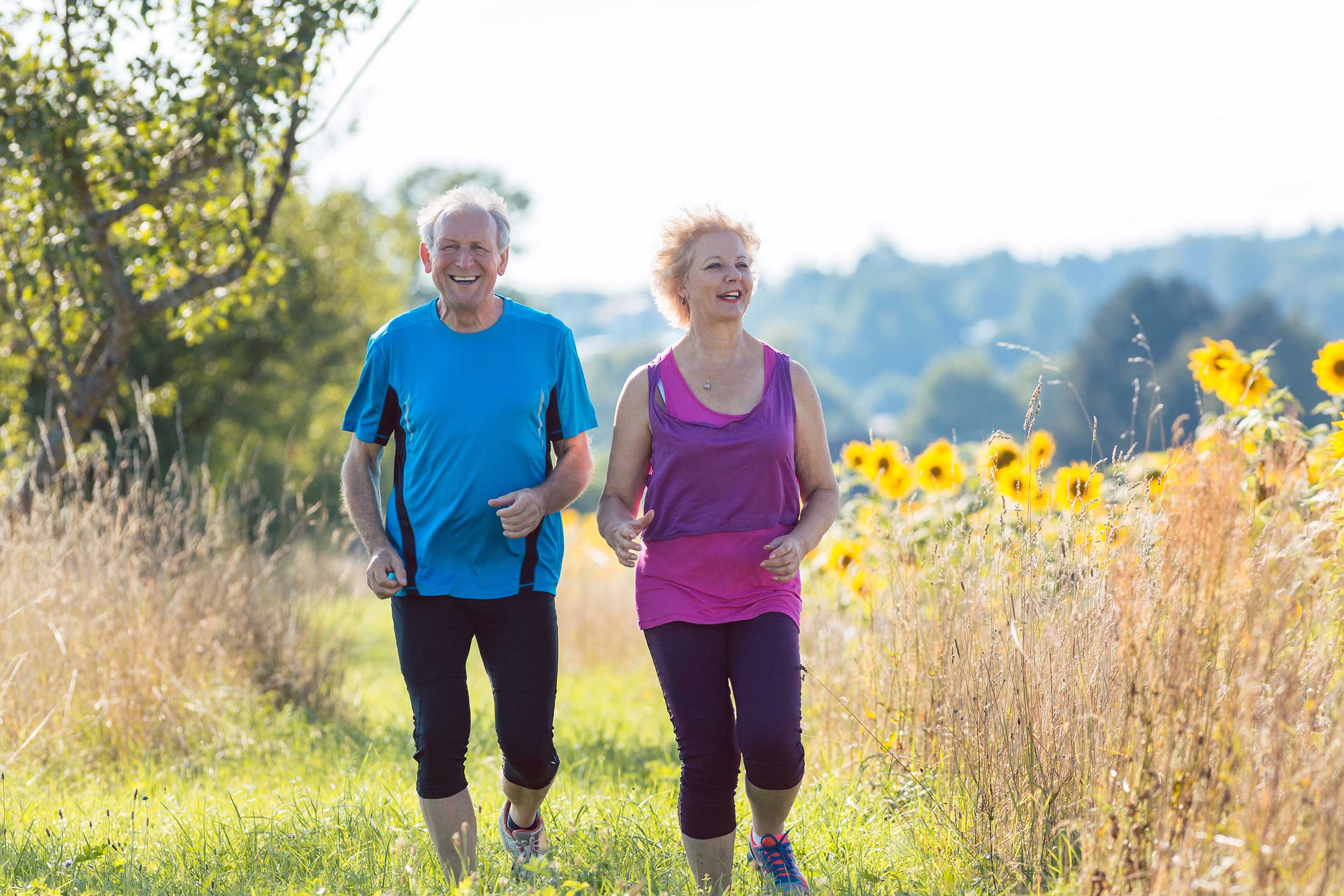 Older couple jogging